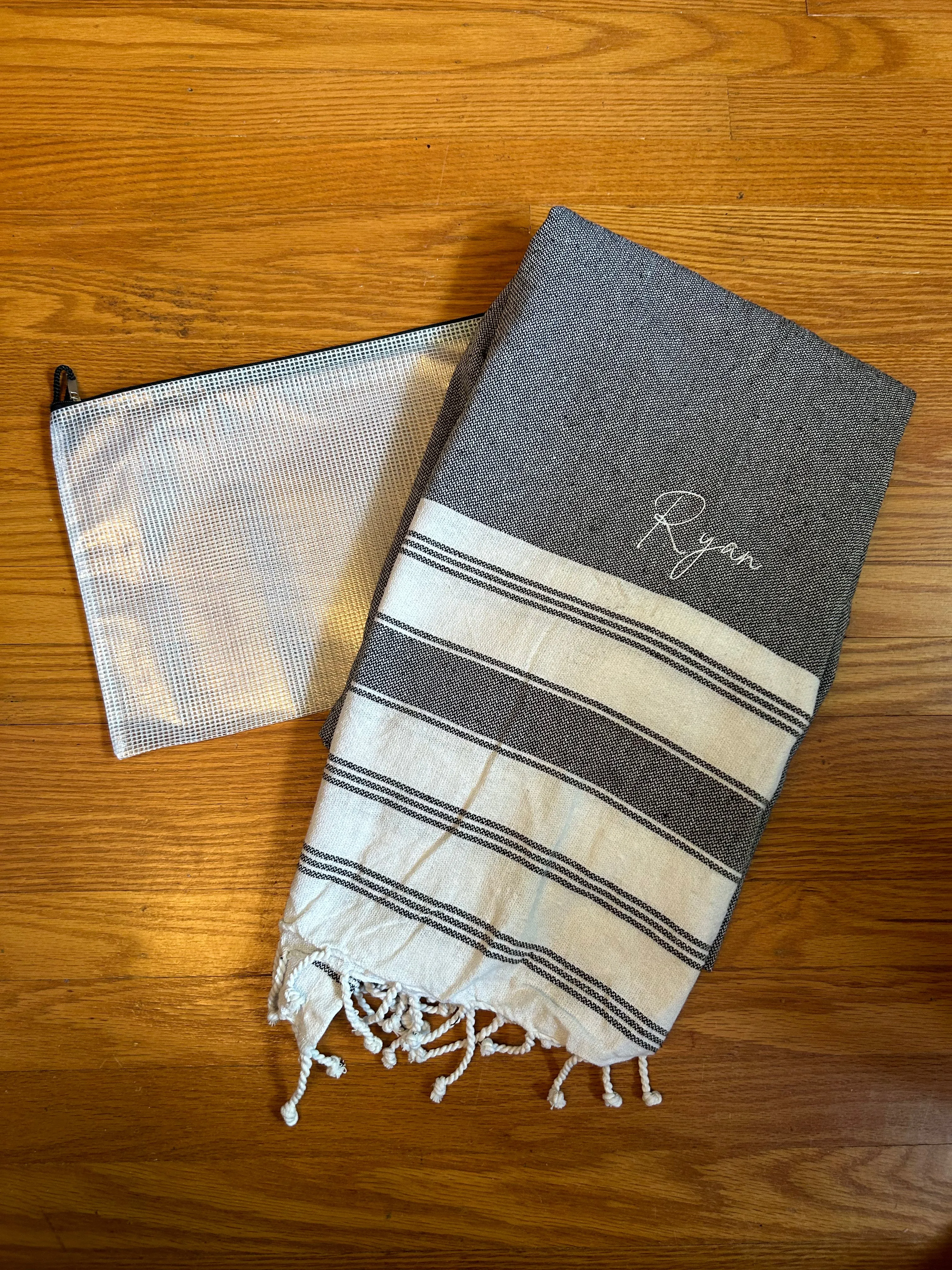 Beach towel and water resistant pouch set
